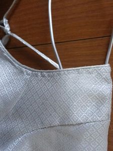 Silver Blouse in Good Condition.
