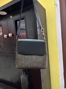 Sling Bag With Adjustable Strip