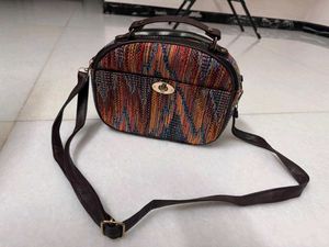 Multi-Color Woven Pattern Sling-cum-Handbag