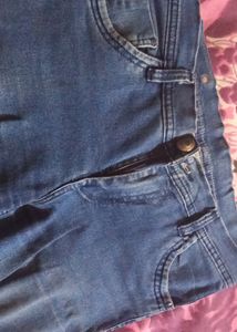 Fadded Damaged Blue Jeans