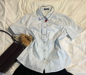 Cute Light Blue ButtonUp Blouse with Ruffle Detail