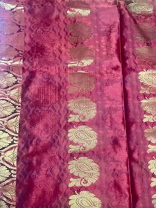 Orange kanchi Pattu Saree With Pink Pallu