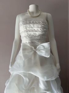 VOLUMINOUS RUFFLED ORGANZA WEDDING GOWN