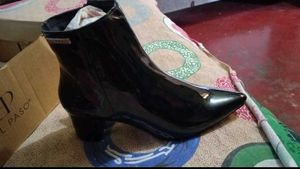 women black heeled Chelsea boots