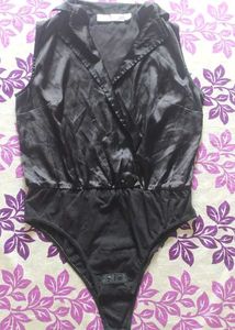 blacksatinbodysuit with a collared, wrap-style Top