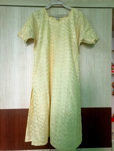 pale yellow Chikankari kurta.