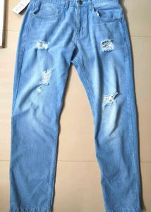 Ripped Light Wash Denim Jeans