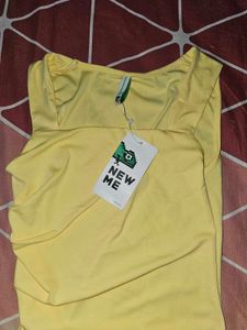 yellow drapped square neck dress