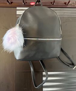 Black Mini Backpack with Pom Po