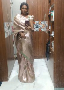 A Beautiful Light Green With Pink Shade Silk Saree