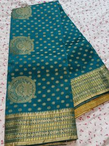 Elegant Teal & Gold Saree