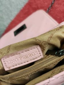 lino Perros pink sling bag