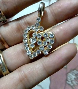 EARRINGS WITH HEART SHAPE LOCKET