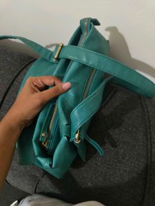Fastrack Teal Sling Bag – Used, Good Condition