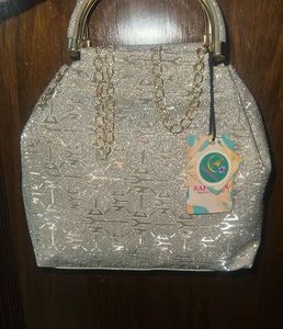 Sparkling golden Handbag