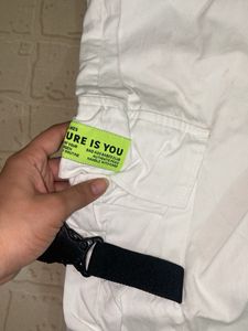 White Cargo Pants with Graphic Details