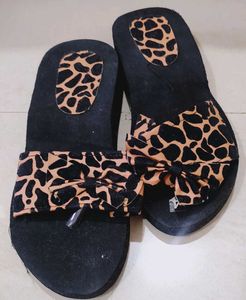 Animal Print Bow Flip Flops never used