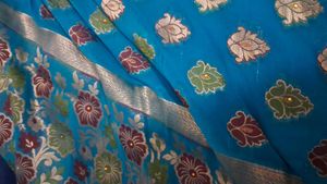 Blue Floral Design  zari work with minute stone