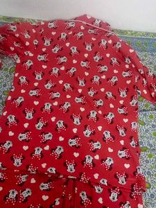 a red night suit gives cozy vibe wth detailings of