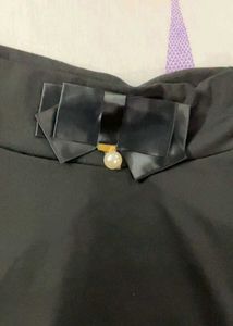 Black Skirt with Bow Detail