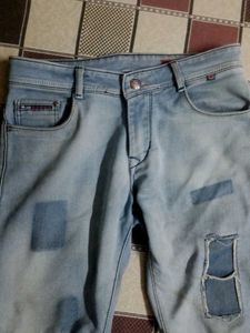 Patched Denim Jeans