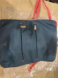 Baggit  Coral  and Teal reversable Crossbody Bag