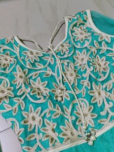 Beautiful sea green gown frock for women.
