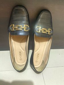 Black Loafers with Gold Detail