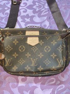 Brand New Louis Vuitton Multi Pouchette Sling Bag.