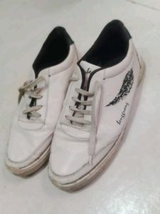 White Sneakers with Feather Design