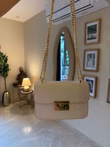 OFF WHITE CHARLES AND KEITH (check Description)