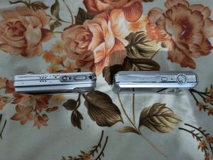 Nikon S1 And Panasonic Lumix Camera