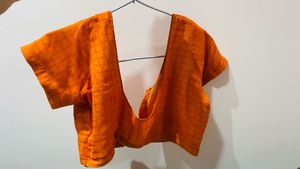 Orange sari with stitched blouse