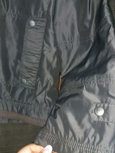 Black Colour Medium Size Jacket With Buttons Zip