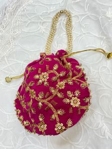 Beautiful Potli With Zari Work