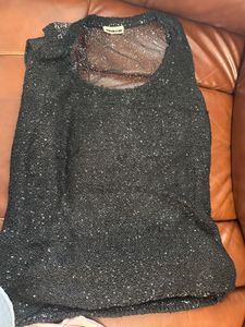 A Black Sequin Top With Net Back