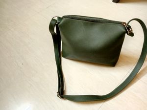 A Green Cute Sling Bag For Daily Use