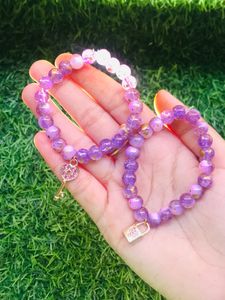 purple marble beads with cute chams.