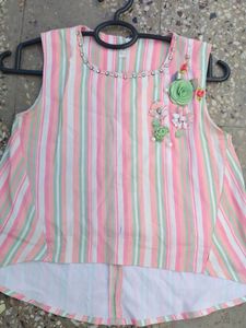 Beautiful top with flower , stone and pearl