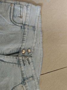 Ripped Denim Capri Jeans