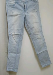 Ice Blue Colour Ripped Jeans