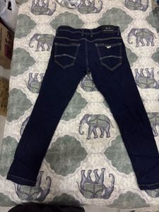 Combo of green shirt and denim jeans