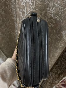 A black crossbody bag
