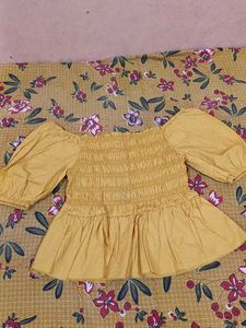 Yellow Smocked Off-Shoulder Top