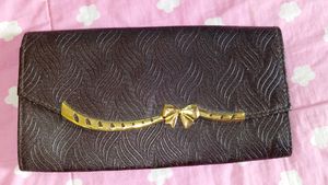 Vintage Bow Accent Clutch