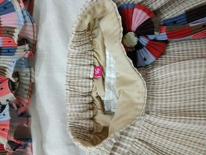 Two Top And Skirts Set