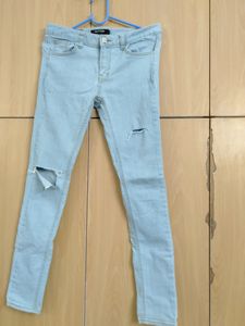 Low Waist Light Blue Ripped Jeans