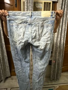 Distressed Denim Jeans