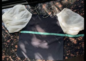 Off shoulder top with rhinestone neckline