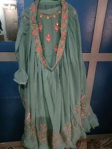 A Georgette Gown With embroidered Shrug.